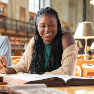 A researcher reads in the Rose Made Reading Room.