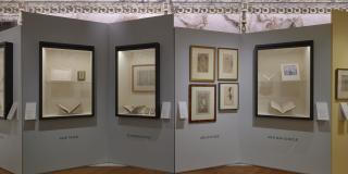 Photograph of exhibition showing one side of the gallery corridor