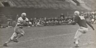 1930–1940, Photograph of famed college football player, Edward Williams, playing for NYU, class of 1940