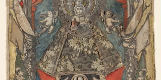 An elaborately decorated print featuring religious imagery and multiple colors