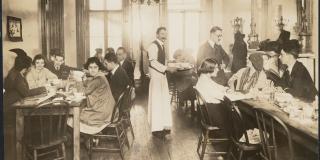 Vintage photograph of a crowded restaurant interior 