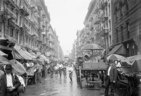 Black and white archival photo of New York street.